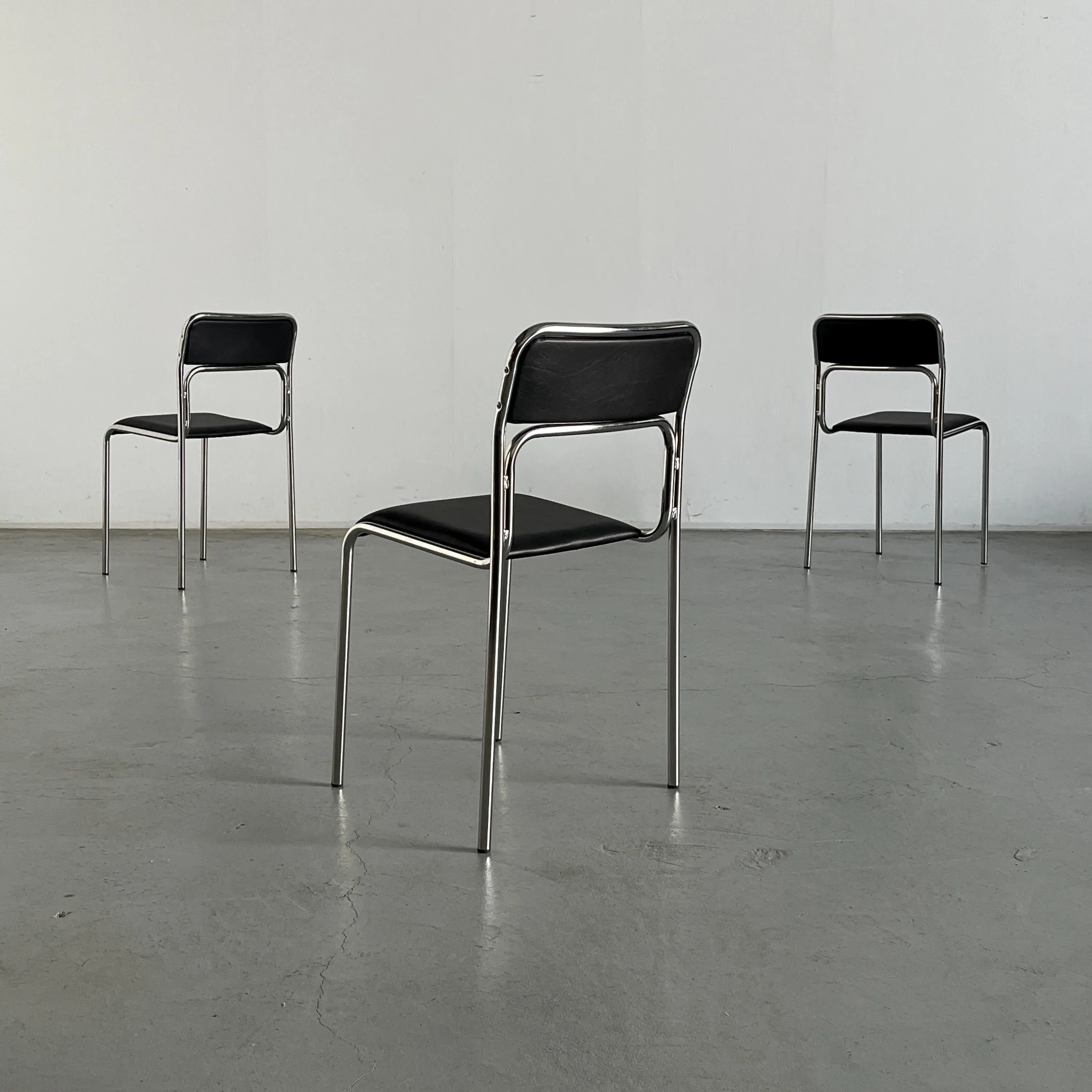Bauhaus Chrome Tubular Steel and Black Faux Leather Chairs