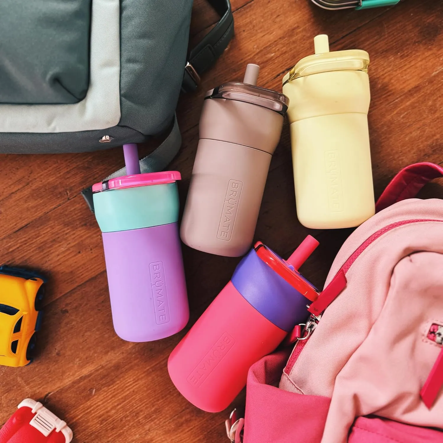 BrüMate Leap 12oz 100% Leakproof Kids Tumbler with Handle and Silicone Soft Straw | Drop Resistant Silicone Sleeve | For Kids 4  | Insulated Stainless Steel | Cup Holder Friendly | 12oz (Mocha)