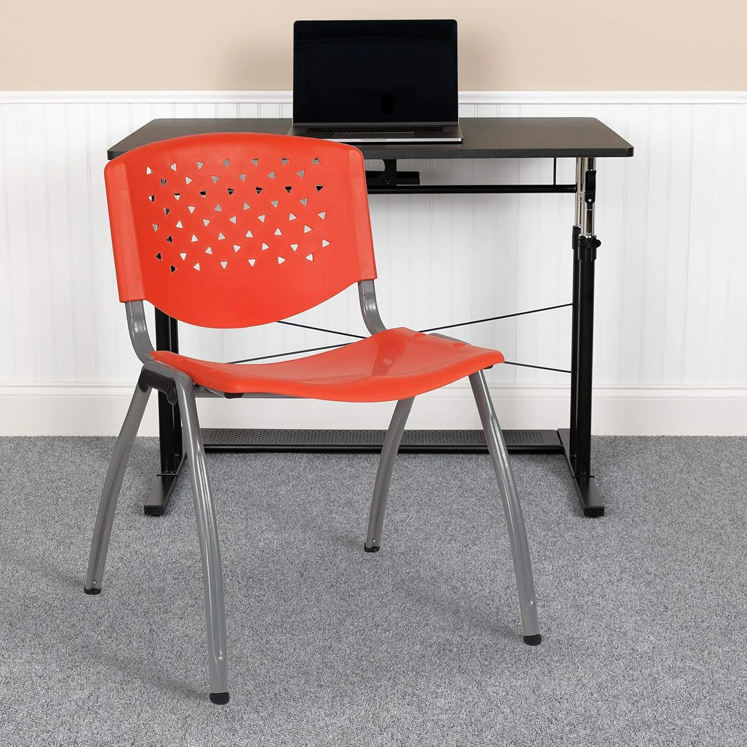 Emma   Oliver Home and Office Orange Plastic Stack Chair with Perforated Back - Guest Chair